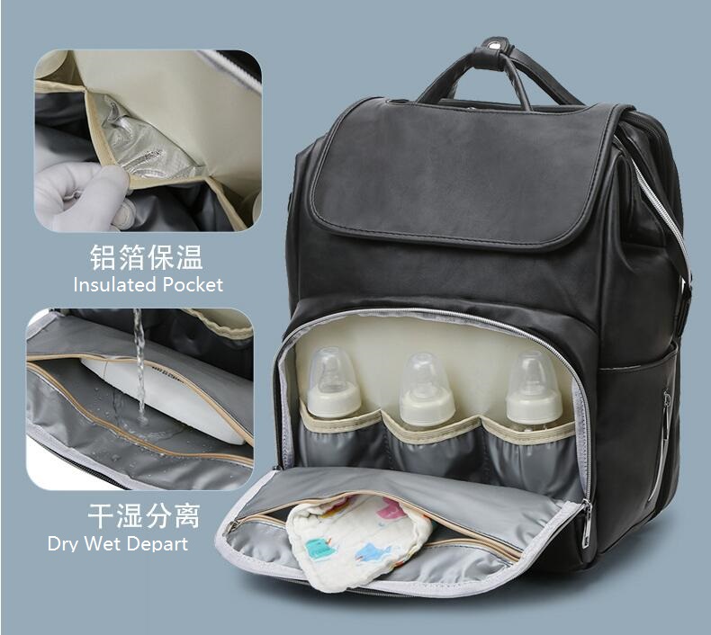 Sac à dos à couches multifonctionnel en cuir PU élégant avec lit bébé