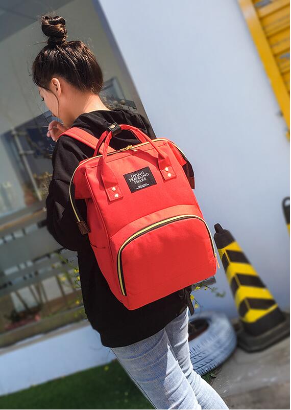 Mod&egrave;le Spectacle de sac &agrave; dos de maman rouge