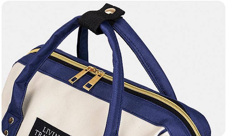 Poign&eacute;e de sac &agrave; dos de maman