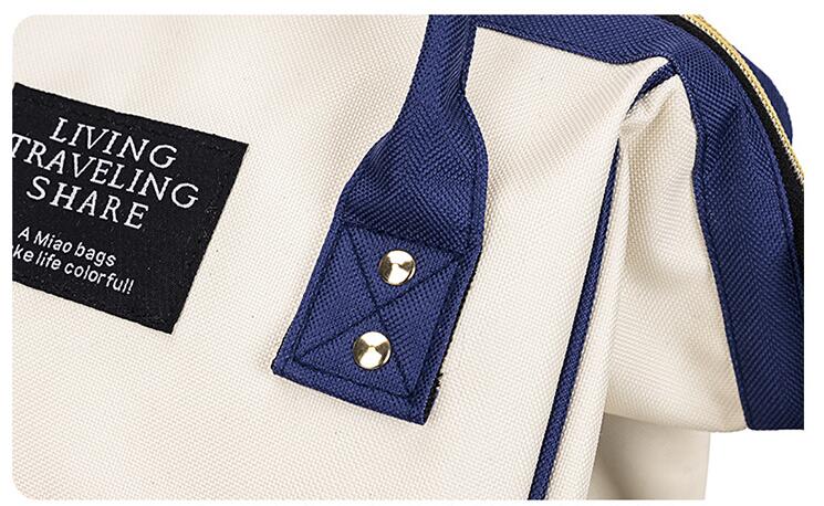 sac &agrave; dos de maman avec poign&eacute;e de renforcement